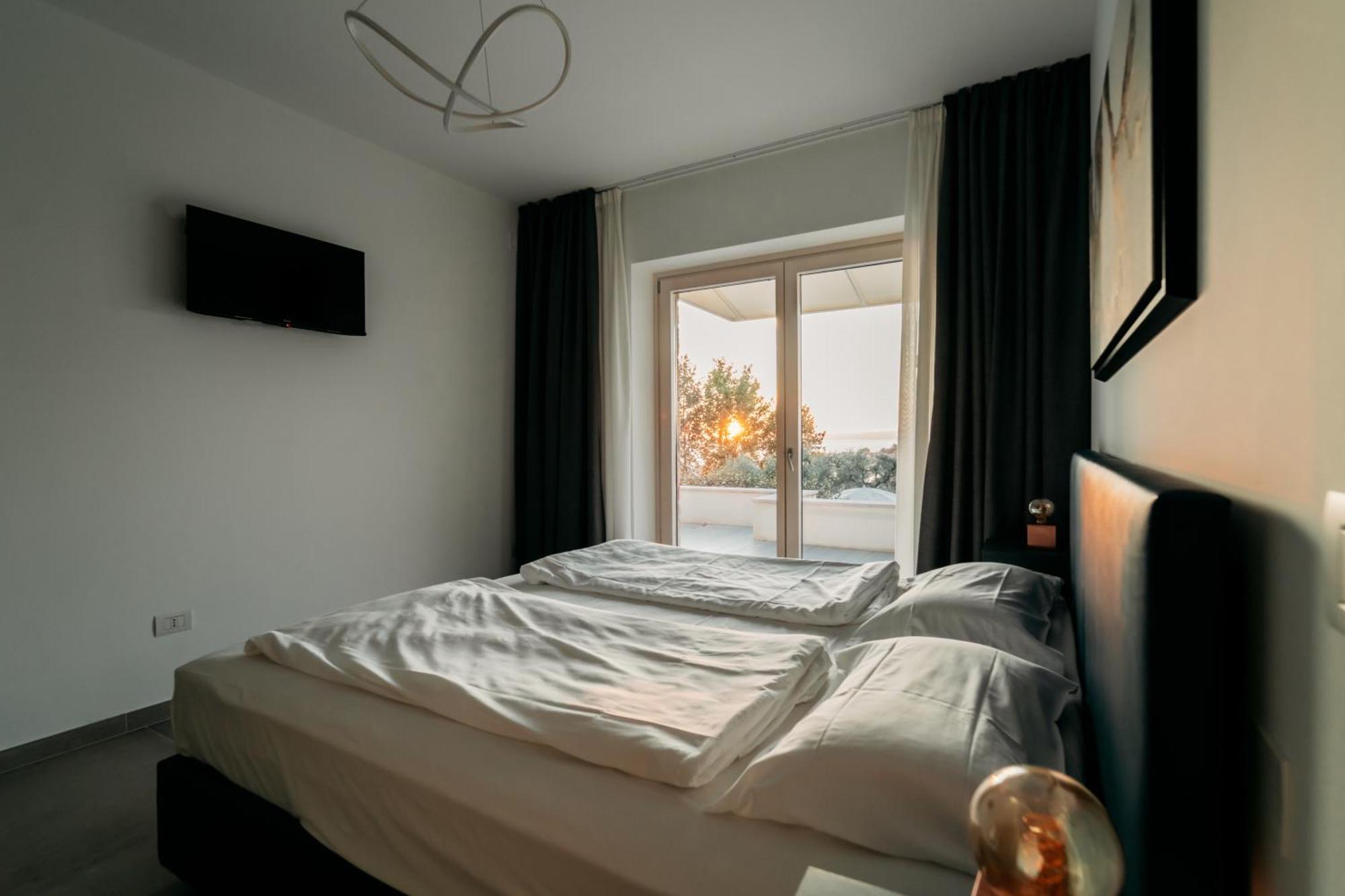 Apartments Monsurei, Lake View Бардолино Экстерьер фото